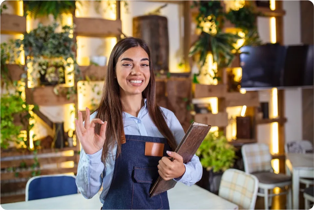Waitress holding menu